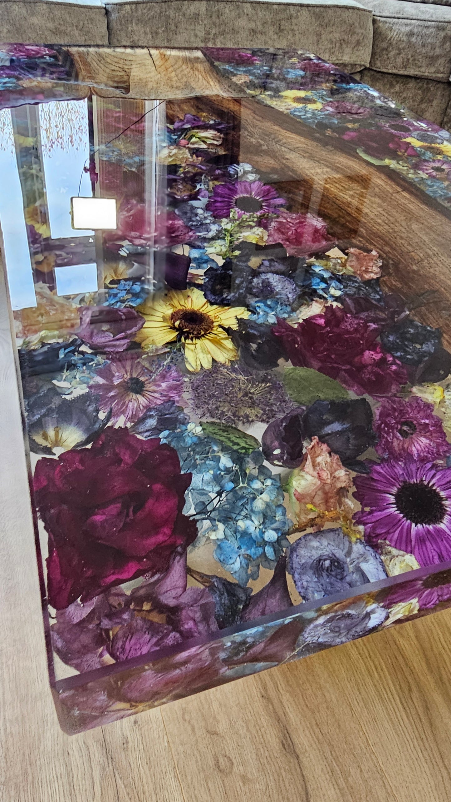 Resin coffee table close up shot of the flowers encased in resin