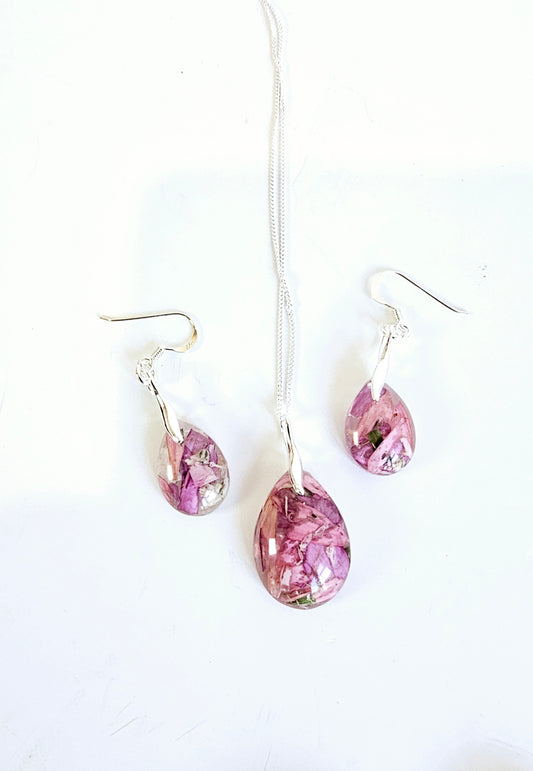 Pink wedding flowers flowers preserved to create a teardrop necklace and earring with sterling silver setting