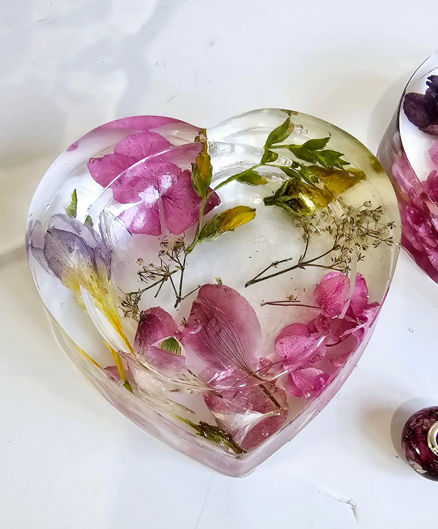 heart resin trinket dish full of pink flowers