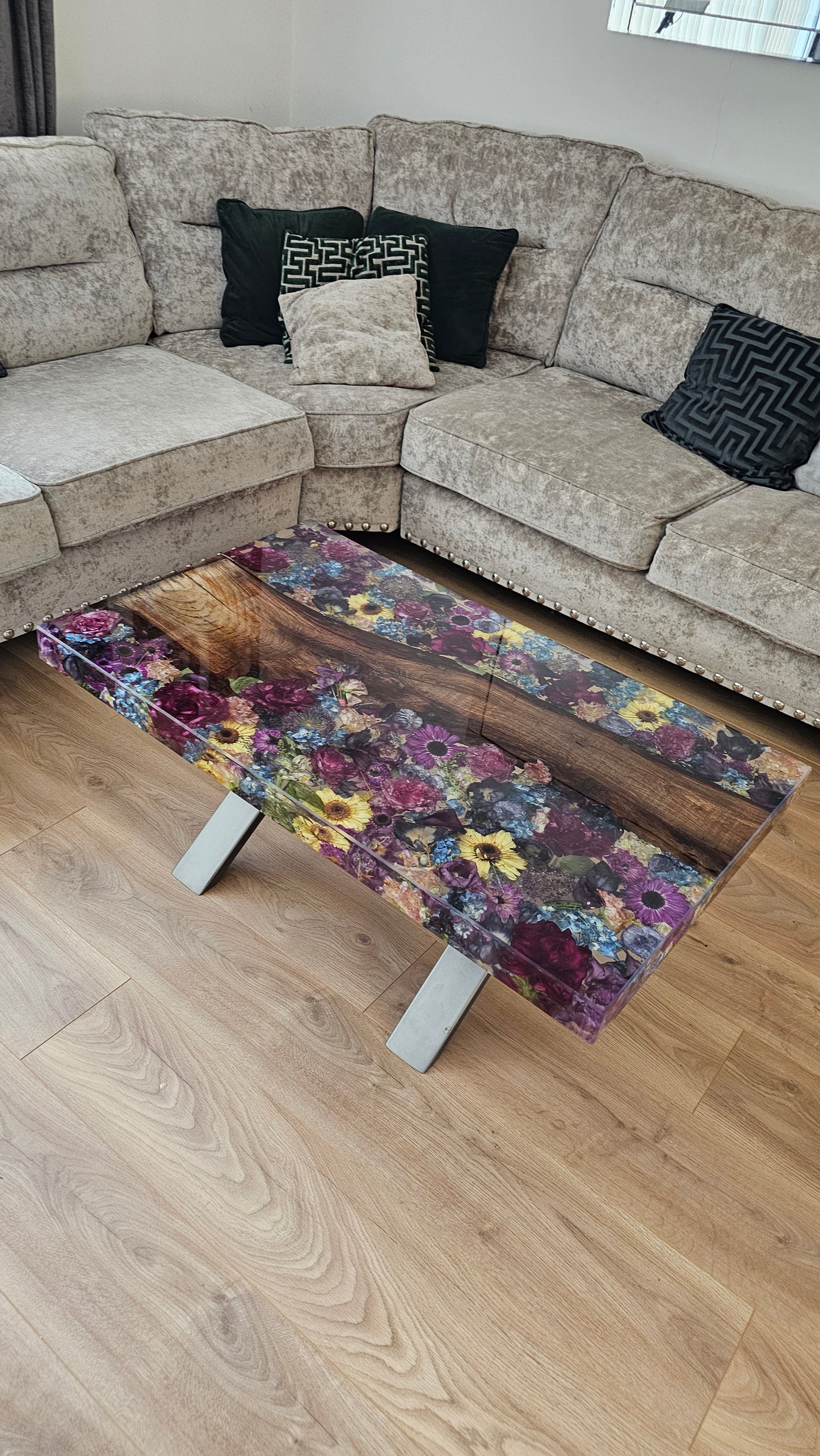 Resin flower preservation coffee tablw with wood inclusion running through the middle 