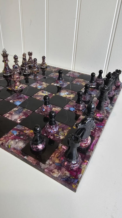 Close up of a resin flower preservation chess boars 