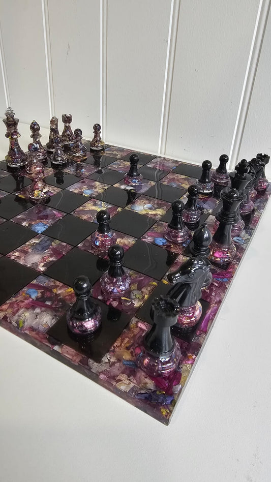Close up of a resin flower preservation chess boars 