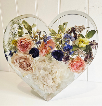 Large resin standing heart flower preservation ornament close up view