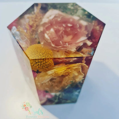 Hexagonal card with floral design on a white background