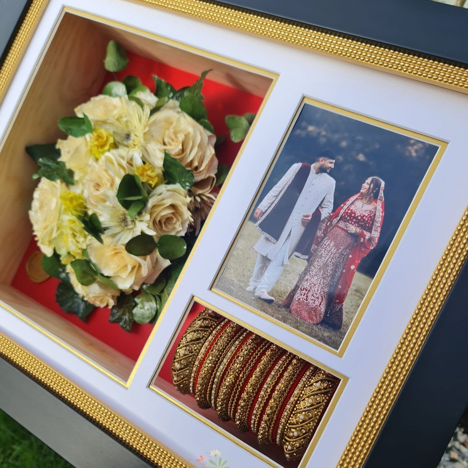 wedding bouquet framed with wedding bangles and photo 