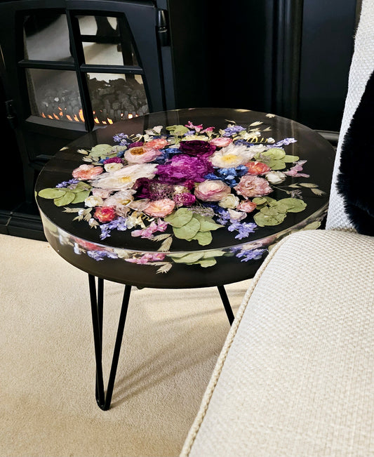 Round table with floral design in a living room setting