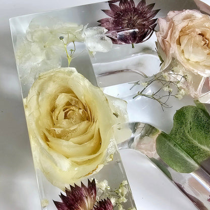 preserved wedding bouquet in resin letter r close up side angle
