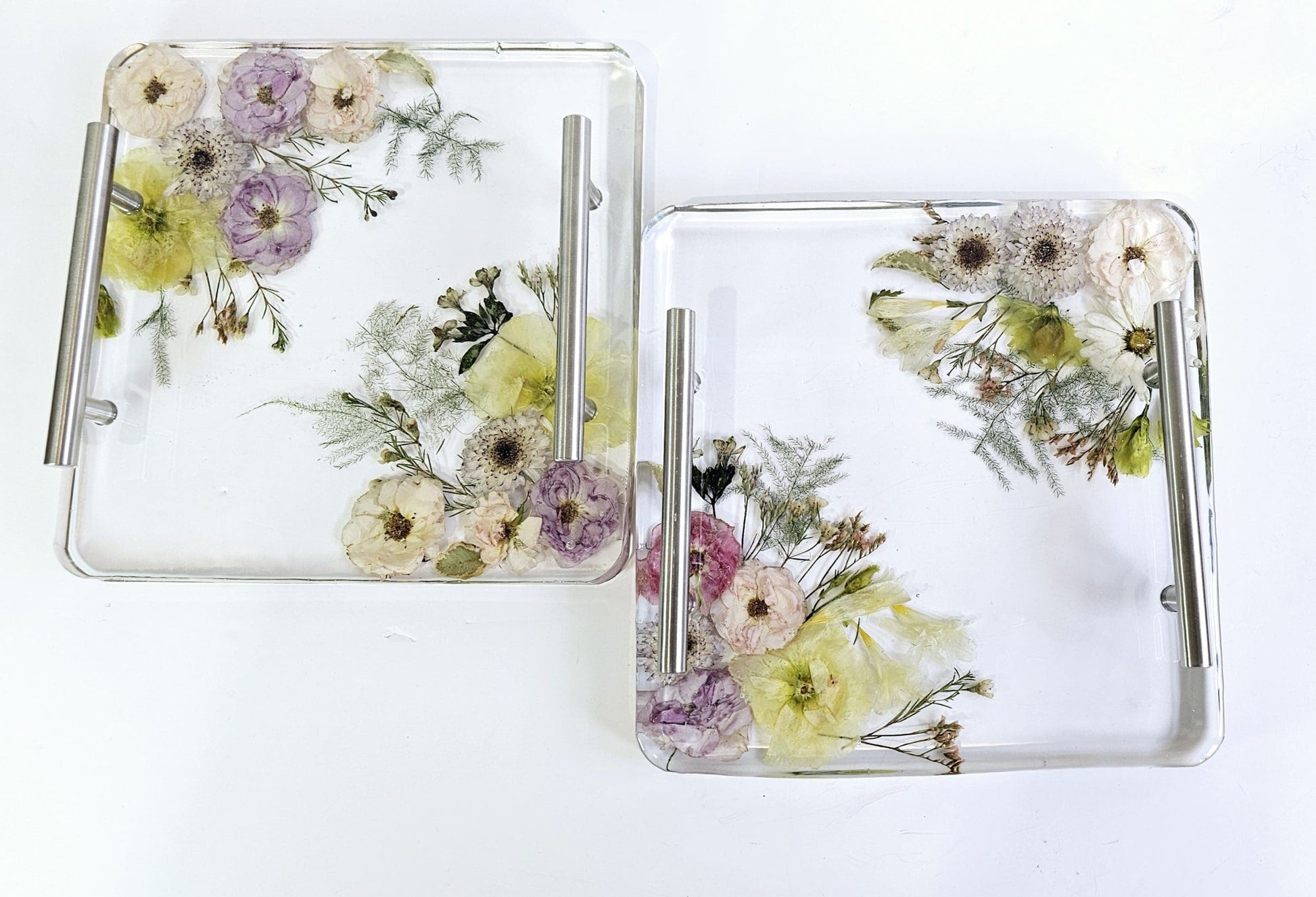 2 square resin funeral flower preservation trays on a white background 