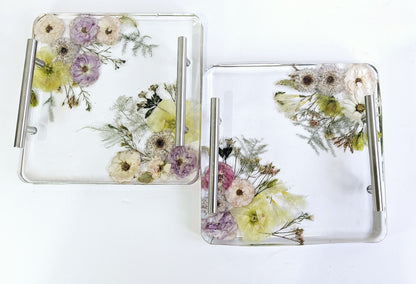 2 square resin funeral flower preservation trays on a white background 